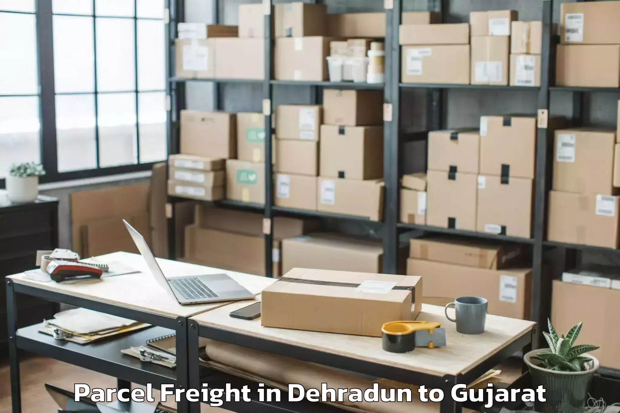 Hassle-Free Dehradun to Delvada Parcel Freight